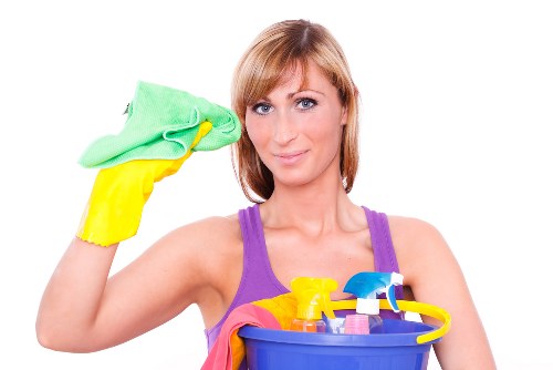 Professional carpets cleaner in Camden cleaning a living room carpet