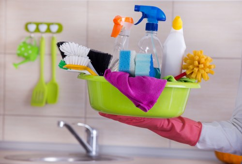 Commercial cleaning team sanitising desks and shared office spaces in Camden