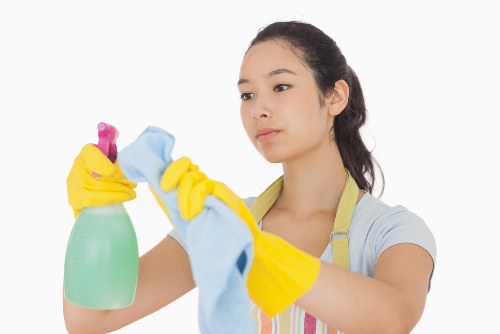 Staff preparing carpet cleaning equipment safely