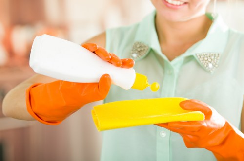 A team member assessing a carpet cleaning complaint carefully
