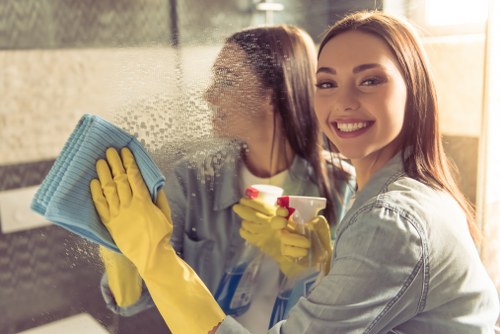 Cleaner checking risk controls before work begins